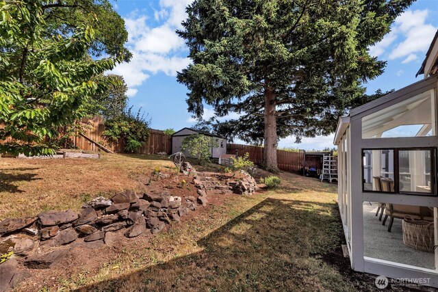 18256 45th Ave S, Seatac, WA 98188 - fenced backyard with a storage unit