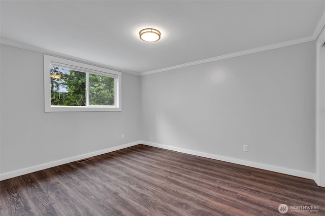 10656 SE 287th St, Auburn, WA 98092 - empty room featuring crown molding and dark wood finished floors
