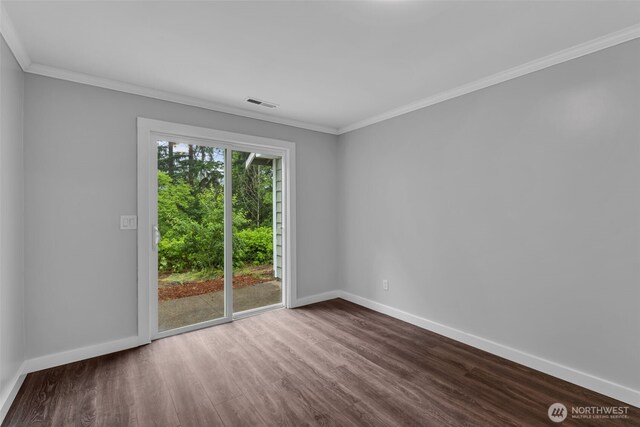 10656 SE 287th St, Auburn, WA 98092 - spare room featuring dark wood-type flooring and crown molding