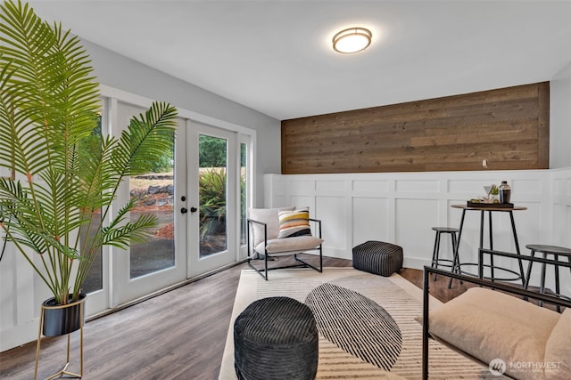 10656 SE 287th St, Auburn, WA 98092 - sitting room with french doors, wood finished floors, and wooden walls