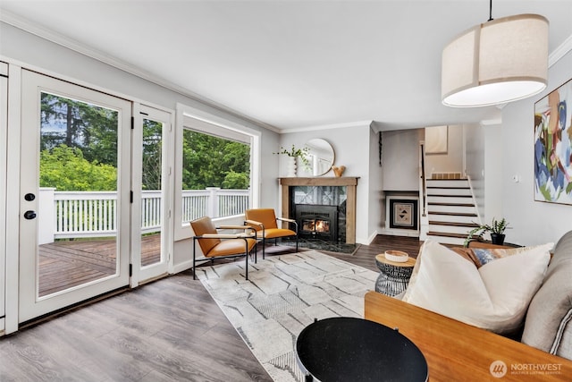10656 SE 287th St, Auburn, WA 98092 - living area featuring ornamental molding, stairs, and wood finished floors