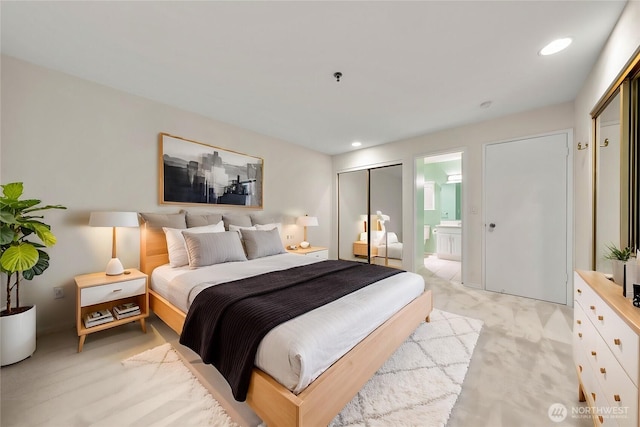 17424 NE 88th Pl Unit B24, Redmond, WA 98052 - bedroom featuring light colored carpet, ensuite bath, and recessed lighting