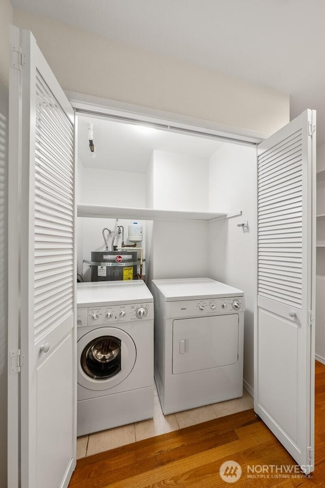 17424 NE 88th Pl Unit B24, Redmond, WA 98052 - washroom featuring independent washer and dryer and light wood-style flooring