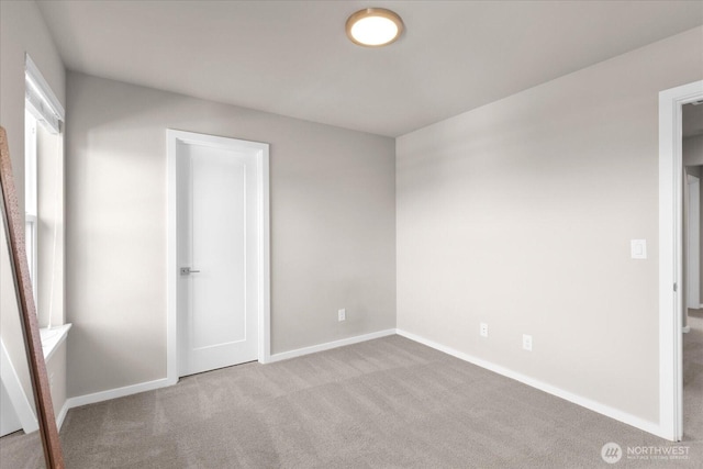 2103 NW 100th Dr SE, Lake Stevens, WA 98258 - unfurnished bedroom with carpet flooring and baseboards