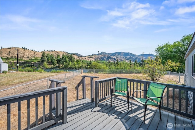138 Trestle View Ln, Dryden, WA 98821 - wooden terrace with a mountain view and a fenced backyard