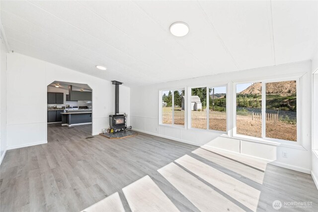 138 Trestle View Ln, Dryden, WA 98821 - unfurnished living room with a wood stove and wood finished floors