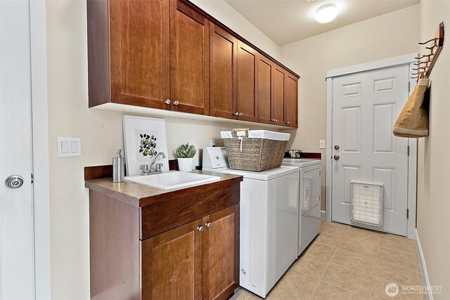 9225 225th Ave E, Buckley, WA 98321 - washroom with washing machine and clothes dryer, cabinet space, and light tile patterned floors