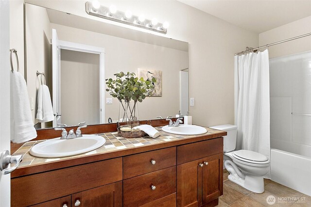 9225 225th Ave E, Buckley, WA 98321 - full bath with double vanity, shower / tub combo, and tile patterned flooring