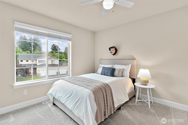 9225 225th Ave E, Buckley, WA 98321 - carpeted bedroom with baseboards and a ceiling fan