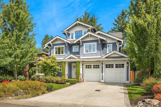 11050 SE 30th St, Bellevue, WA 98004 - craftsman inspired home featuring driveway, board and batten siding, a shingled roof, a garage, and covered porch
