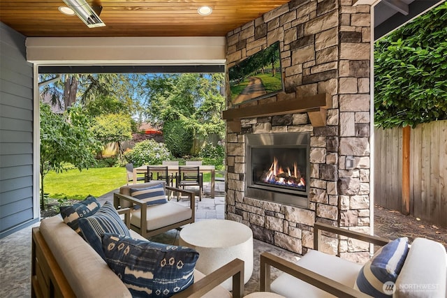 11050 SE 30th St, Bellevue, WA 98004 - fenced backyard featuring an outdoor living space with a fireplace and a patio area