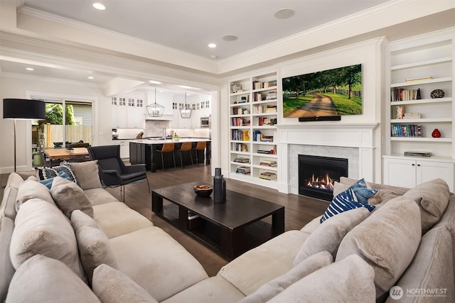 11050 SE 30th St, Bellevue, WA 98004 - living area featuring dark wood-type flooring, ornamental molding, a premium fireplace, and recessed lighting