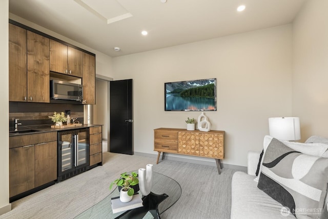 5009 Ocean Ave, Everett, WA 98203 - living room featuring wine cooler, light colored carpet, bar area, and recessed lighting