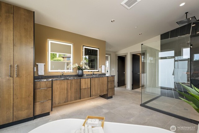 5009 Ocean Ave, Everett, WA 98203 - full bathroom featuring a shower stall, double vanity, a tub to relax in, vaulted ceiling, and recessed lighting