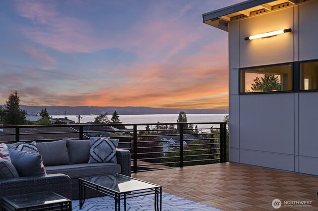 5009 Ocean Ave, Everett, WA 98203 - deck at dusk with a water view and an outdoor living space