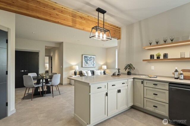 5009 Ocean Ave, Everett, WA 98203 - kitchen with light countertops, a peninsula, dishwashing machine, pendant lighting, and open floor plan