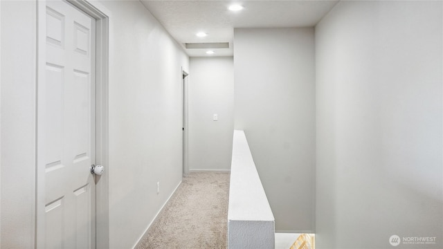 920 E Mt Adams St, Othello, WA 99344 - hallway with carpet flooring and recessed lighting