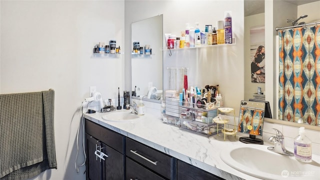 920 E Mt Adams St, Othello, WA 99344 - full bathroom with double vanity and a shower with shower curtain