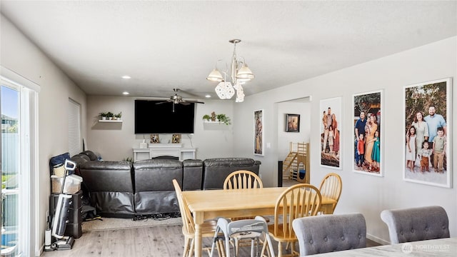 920 E Mt Adams St, Othello, WA 99344 - dining space featuring a ceiling fan, light wood-style floors, a chandelier, and recessed lighting
