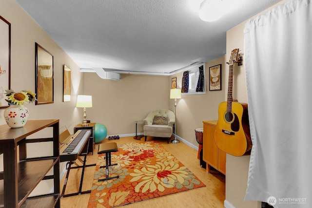 11729 Phinney Ave N, Seattle, WA 98133 - living area with light wood finished floors and a textured ceiling