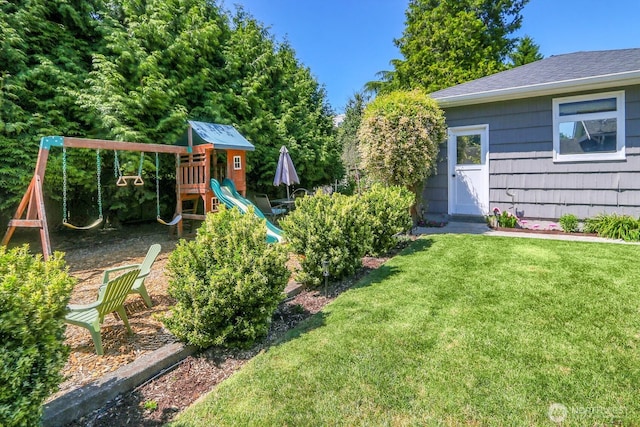 11729 Phinney Ave N, Seattle, WA 98133 - view of grassy yard with a playground