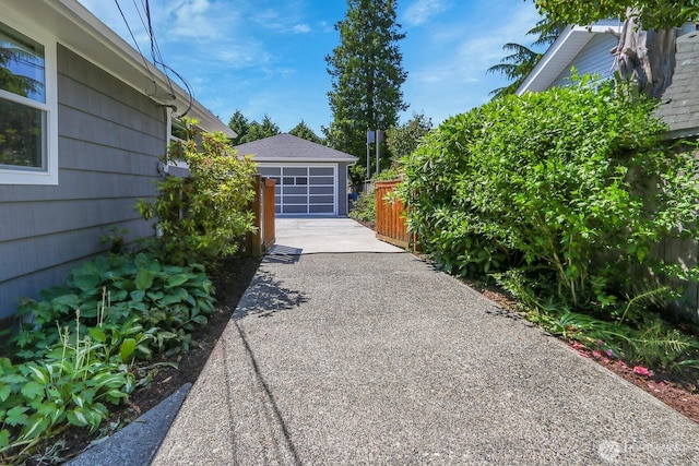 11729 Phinney Ave N, Seattle, WA 98133 - exterior space featuring an outbuilding and concrete driveway