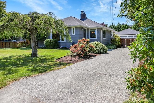 11729 Phinney Ave N, Seattle, WA 98133 - view of front facade featuring a chimney and roof with shingles