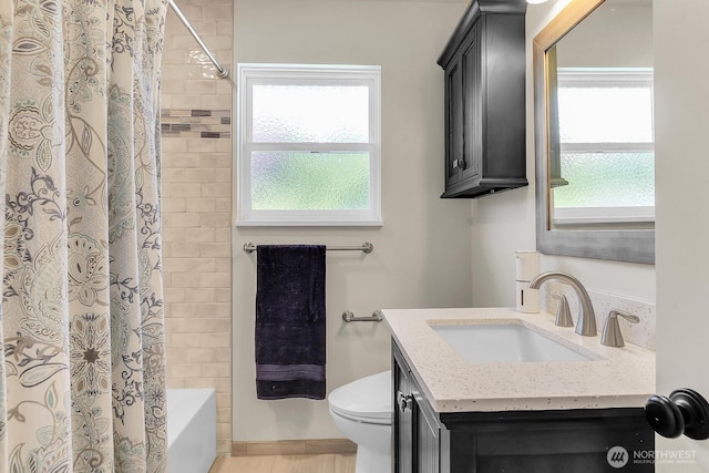 11729 Phinney Ave N, Seattle, WA 98133 - bathroom with vanity and shower / tub combo
