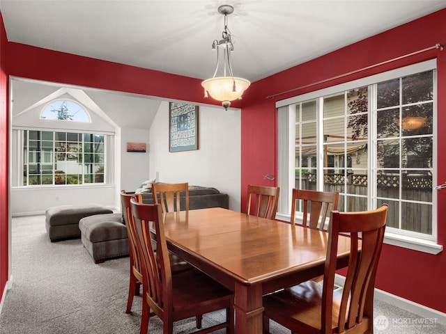 9114 80th Ave SW, Lakewood, WA 98498 - carpeted dining space featuring vaulted ceiling and baseboards