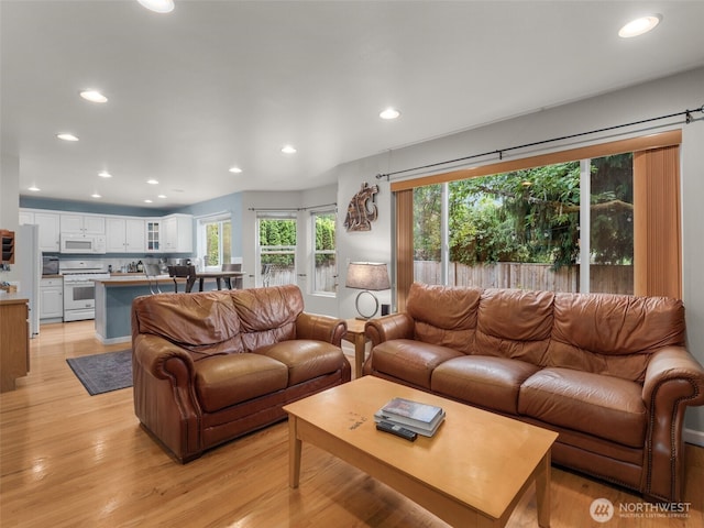 9114 80th Ave SW, Lakewood, WA 98498 - living room with recessed lighting and light wood-type flooring