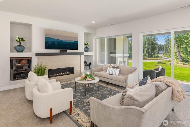 11306 143rd Dr NE, Lake Stevens, WA 98258 - carpeted living room with a high end fireplace, built in features, and recessed lighting