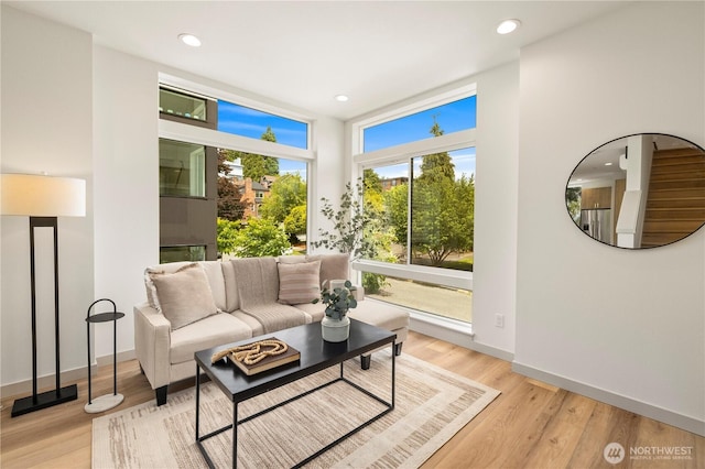 7013 9th Ave NE, Seattle, WA 98115 - living area featuring recessed lighting and light wood-style floors