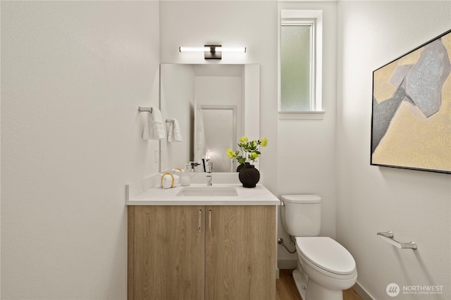 7013 9th Ave NE, Seattle, WA 98115 - bathroom featuring vanity and wood finished floors
