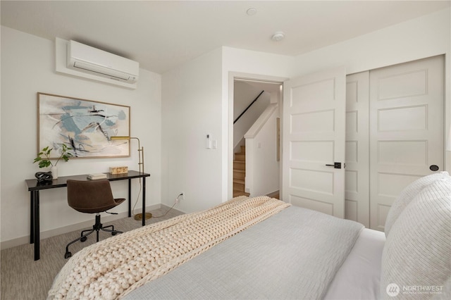 7013 9th Ave NE, Seattle, WA 98115 - carpeted bedroom featuring an AC wall unit and a closet