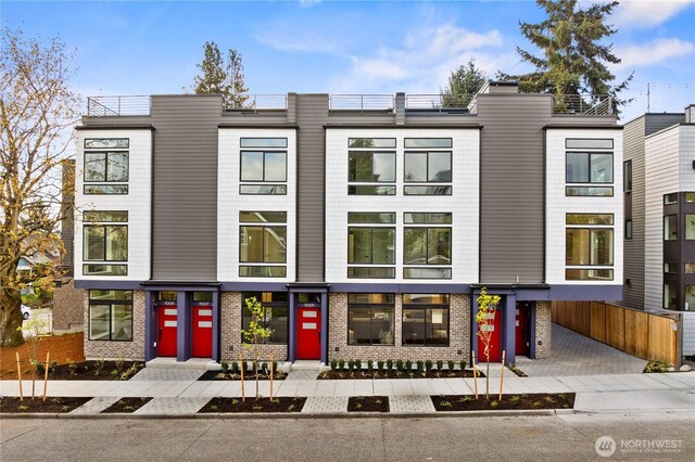 7013 9th Ave NE, Seattle, WA 98115 - view of front of house with brick siding
