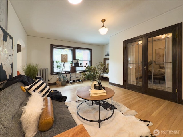 2328 10th Ave E Unit 102, Seattle, WA 98102 - living area with wood finished floors and radiator
