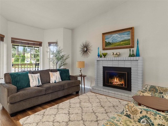 4607 225th Street Ct E, Spanaway, WA 98387 - living room with wood finished floors and a fireplace