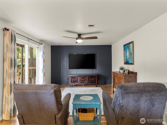 4607 225th Street Ct E, Spanaway, WA 98387 - living area with wood finished floors and a ceiling fan