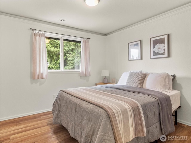 4607 225th Street Ct E, Spanaway, WA 98387 - bedroom with baseboards and wood finished floors
