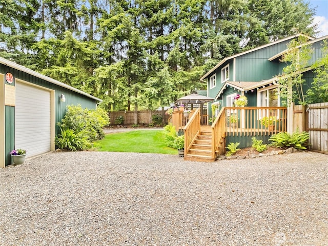 4607 225th Street Ct E, Spanaway, WA 98387 - view of yard with a deck and gravel driveway