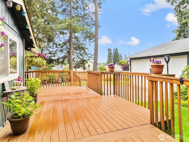 4607 225th Street Ct E, Spanaway, WA 98387 - wooden deck with a garage