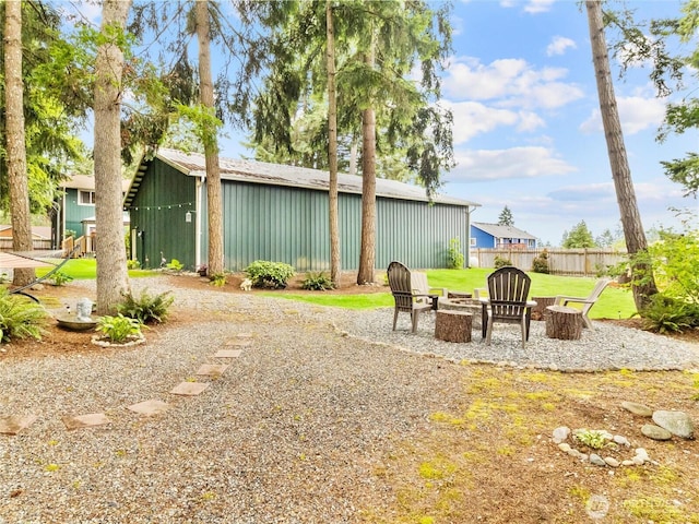 4607 225th Street Ct E, Spanaway, WA 98387 - view of yard featuring an outdoor fire pit