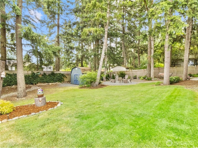 4607 225th Street Ct E, Spanaway, WA 98387 - fenced backyard featuring a storage unit