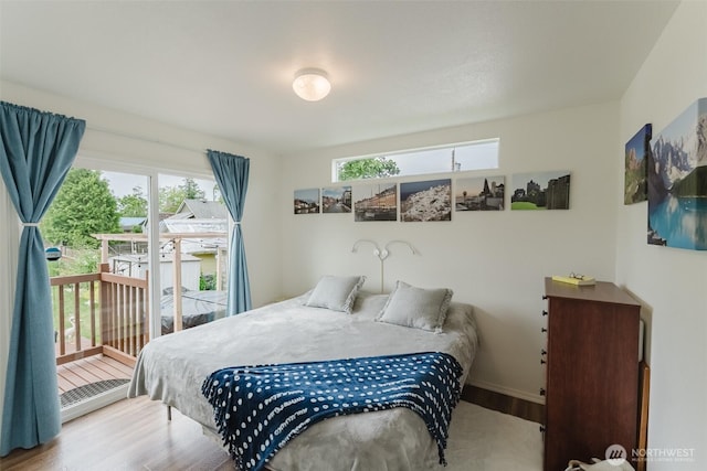 7543 Wooldridge Dr, Blaine, WA 98230 - bedroom featuring wood finished floors and access to exterior