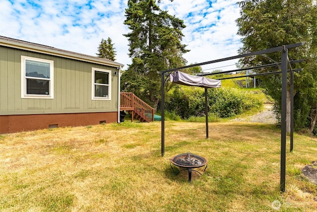 7543 Wooldridge Dr, Blaine, WA 98230 - view of green lawn featuring a fire pit and stairs