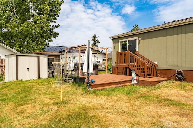7543 Wooldridge Dr, Blaine, WA 98230 - view of green lawn featuring a storage shed and a wooden deck