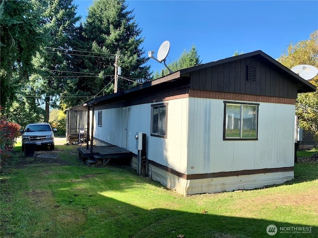 818 D St, Vader, WA 98593 - view of home's exterior featuring a yard