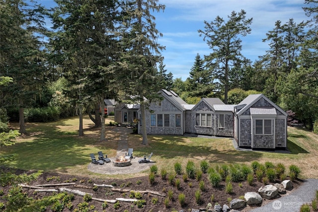 16 Bayshore Rd, Friday Harbor, WA 98250 - view of green lawn featuring a fire pit