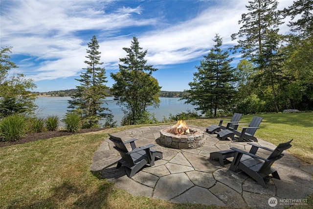 16 Bayshore Rd, Friday Harbor, WA 98250 - view of patio / terrace featuring an outdoor fire pit and a water view
