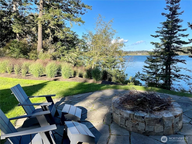 16 Bayshore Rd, Friday Harbor, WA 98250 - view of patio / terrace featuring a fire pit and a water view